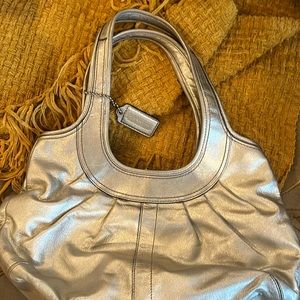 Silver, Coach purse.
